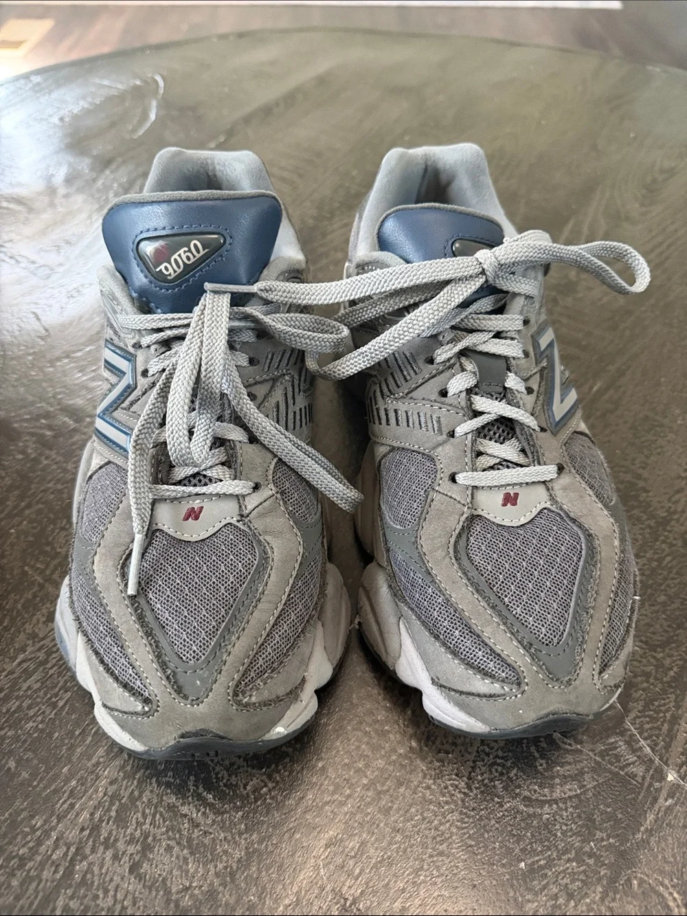 New Balance 9060 Gray Sneakers with Blue Logo Accents